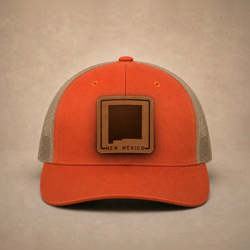 Orange New Mexico hats — New Mexico Outline Leather Patch Trucker Hat
