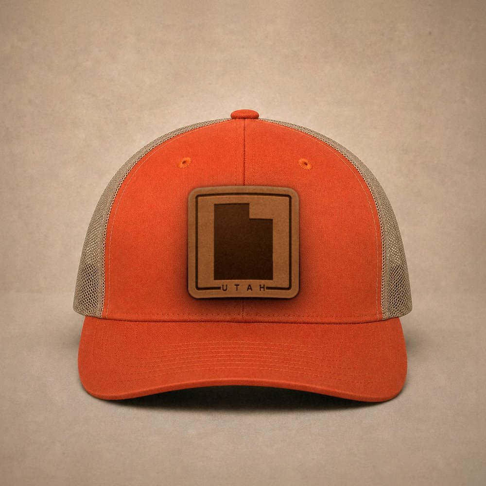 Orange Utah hats — Utah Outline Leather Patch Trucker Hat