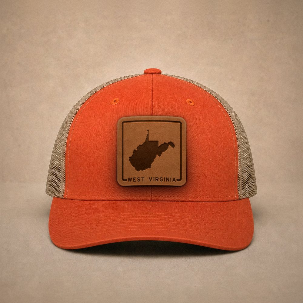 Orange West Virginia hats — West Virginia Outline Leather Patch Trucker Hat