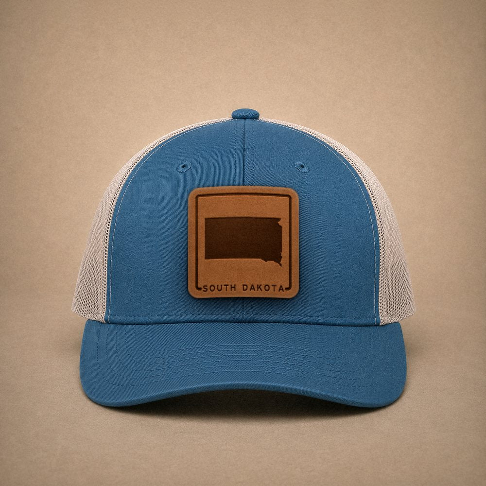 Steel Blue South Dakota hats — South Dakota Outline Leather Patch Trucker Hat
